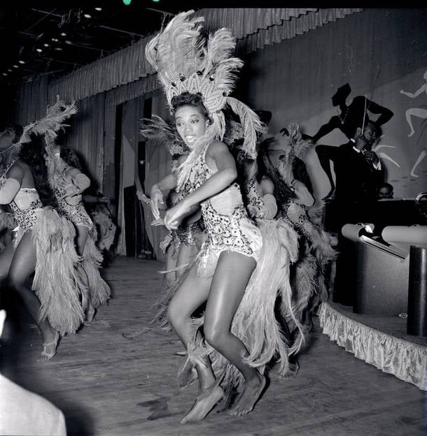 Boots Wade and other dancers perform at the Moulin Rouge’s opening on May 24, 1955.