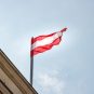 Austrian flag on top of a government building