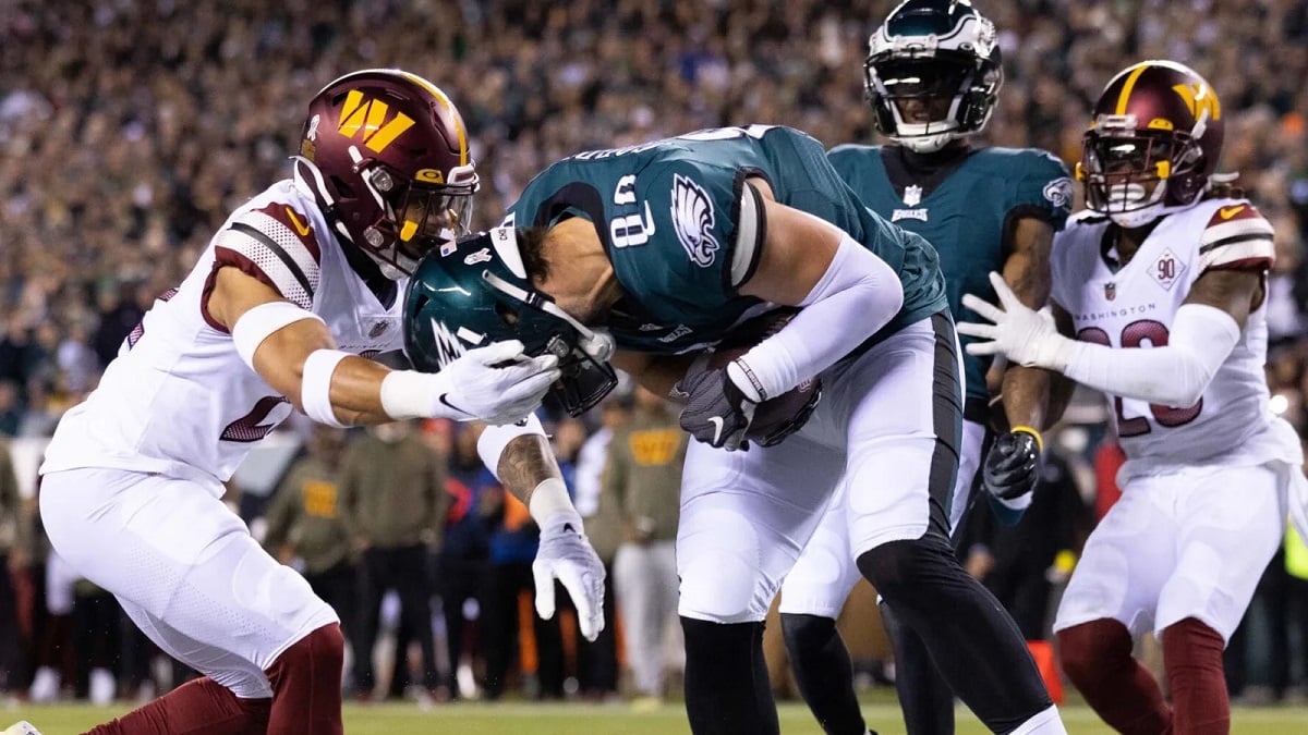 Dallas Goedert TE shoulder injury Philadelphia Eagles face mask controversial Commanders