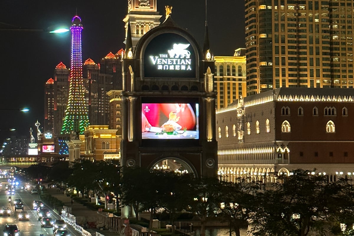 Macau casino revenue IVS visa China COVID-19