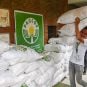 PAGCOR representative distributes relief packs to areas hit by Super Typhoon.