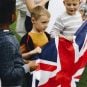 Group of kids holding a UK flag