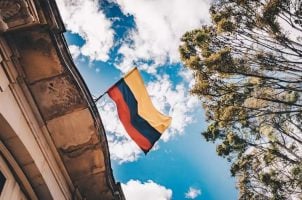 Colombia's flag flies outside a building