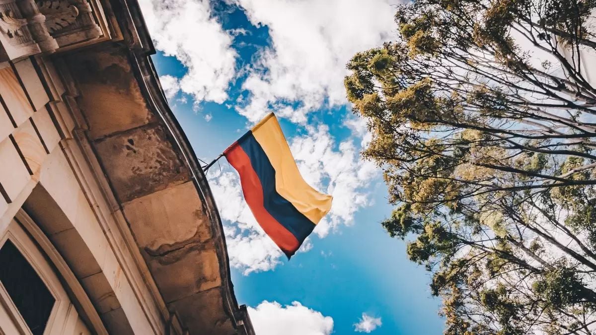 Colombia's flag flies outside a building