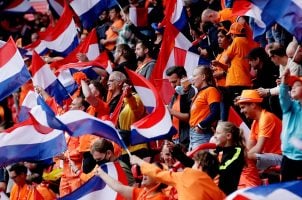 Netherlands soccer fans cheer during the World Cup in Qatar