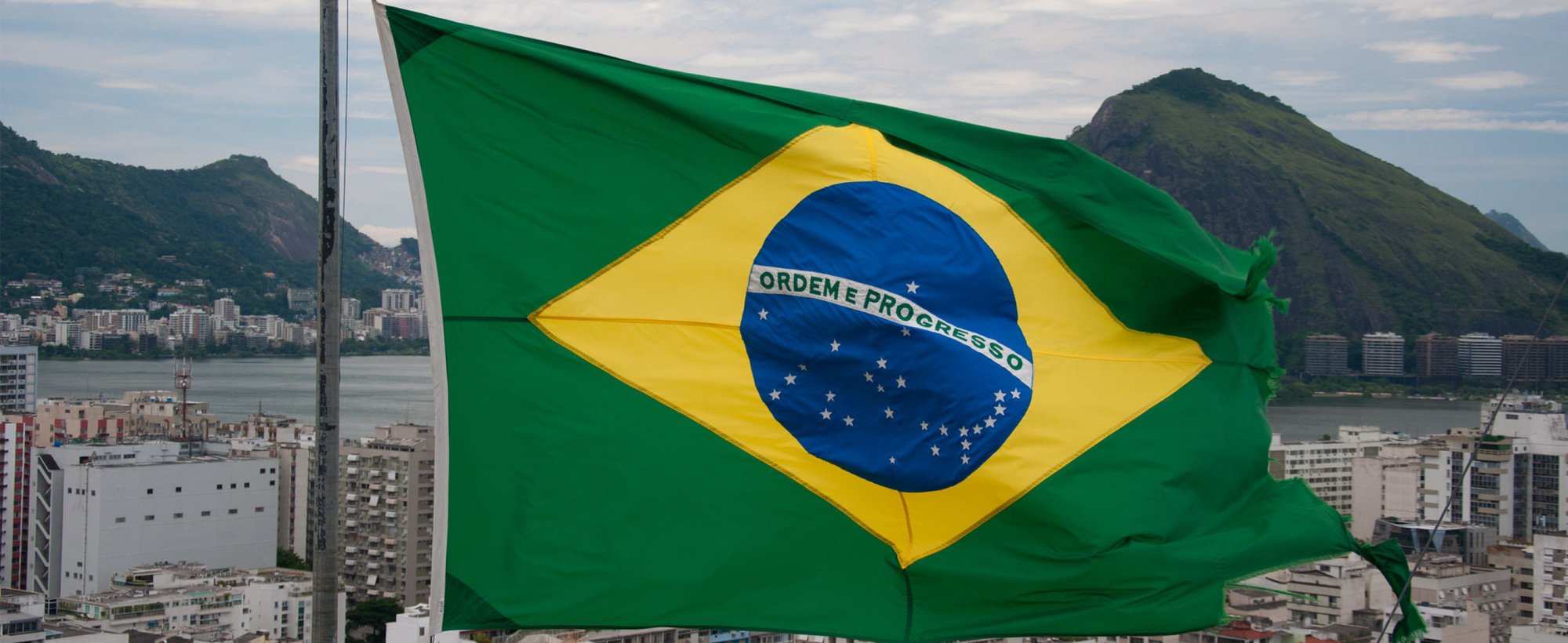Brazil's flag flies on top of a building