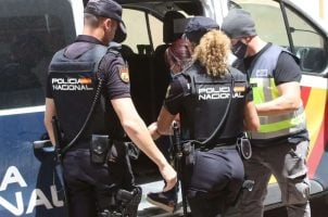 Officers with the Spanish National Police on the job