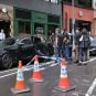 Hong Kong Police investigators inspect a vehicle involved in a triad-related fight