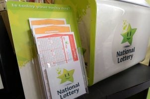 A display for the Irish Lottery greets consumers in a store