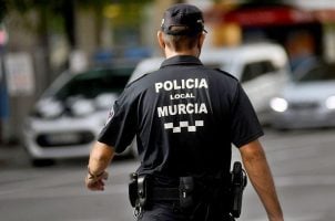 A police officer on patrol in Murcia, Spain