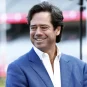 AFL boss Gillon McLachlan in an interview on an AFL field.