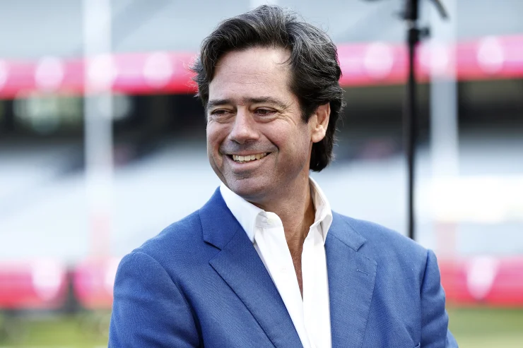 AFL boss Gillon McLachlan in an interview on an AFL field.