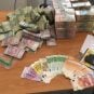 Counterfeit euro notes on display after a Europol bust