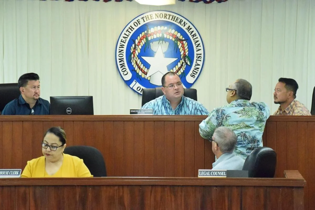 Members of the CNMI House of Representatives discuss budget issues in a session