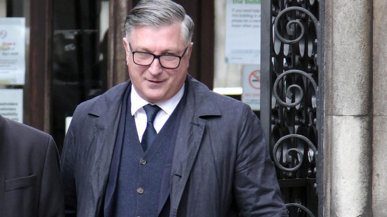 Millionaire Scott O'Brien leaves a British courtroom