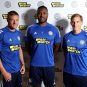 Players with the Leicester City soccer team wear team jerseys sporting sponsor Parimatch