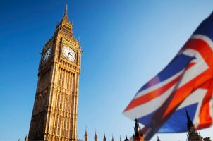 The UK flag flies in front of Big Ben