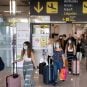 Visitors enter the Spanish city of Ibiza at the Ibiza Airport