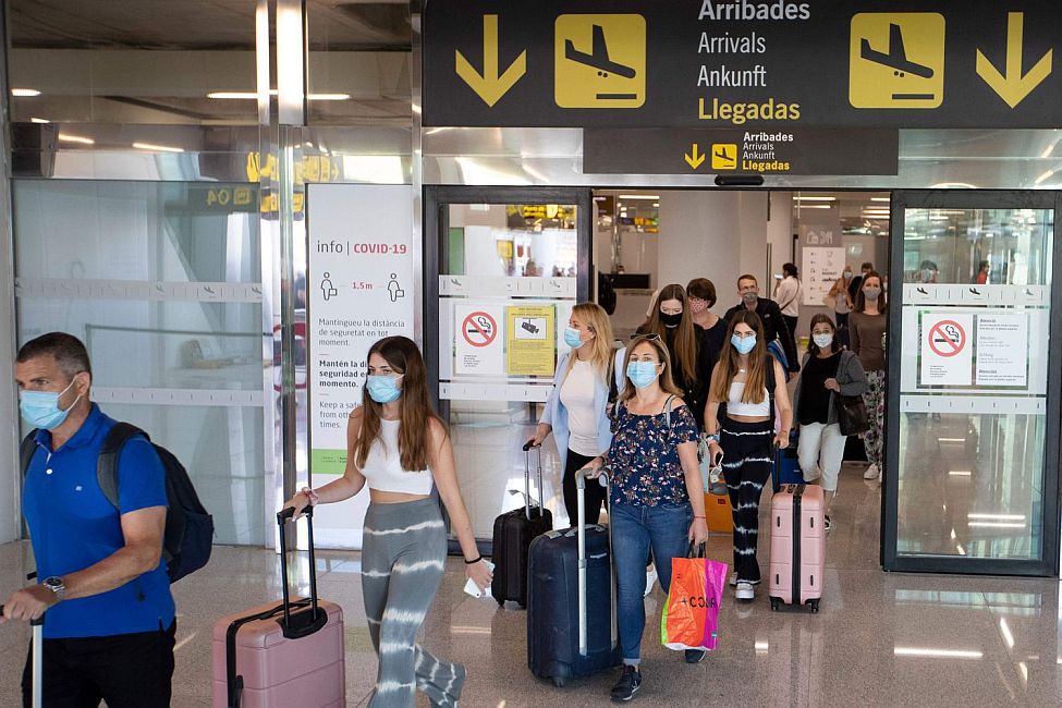 Visitors enter the Spanish city of Ibiza at the Ibiza Airport
