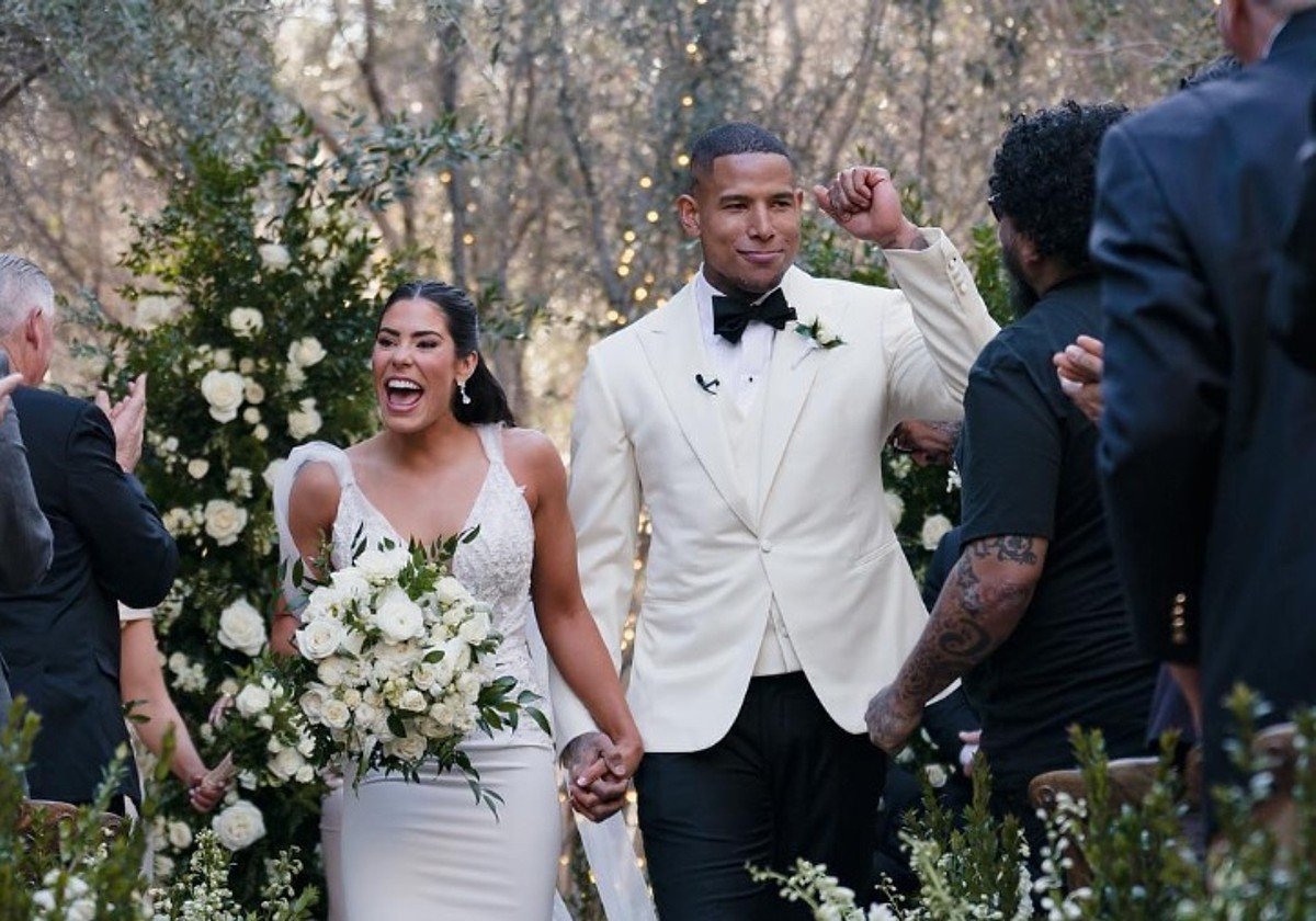 Kelsey Plum and Darren Walker walk the aisle on March 4 in their hometown, Las Vegas. (Image: Instagram)