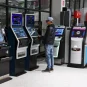 A Veikkaus customer uses a gaming machine