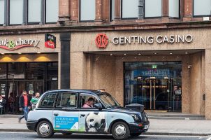 A taxi sits in front of a Genting Casino property in the UK
