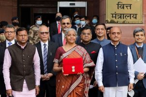 India's Finance Minister Nirmala Sitharaman (center) with government officials before presenting India's new budget last year