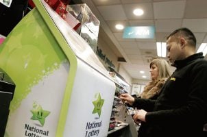 Irish lottery players prepare to make their selections
