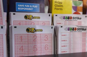 Oz Lotto lottery tickets on display at a store