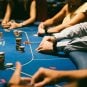 Poker players play a hand of Texas Hold'em