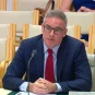 Sportsbet CEO Barni Evans speaks during a hearing on online gaming in Australia