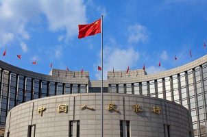 The Chinese flag flies outside the country's central bank