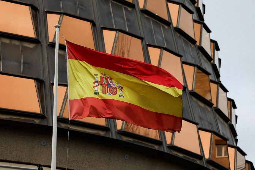 The Spanish flag flies on the Constitutional Court in Madrid