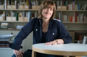 Baroness Beeban Kidron in a library