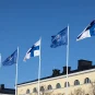 Flags of Finland and NATO in front of the Ministry for Foreign Affairs of Finland