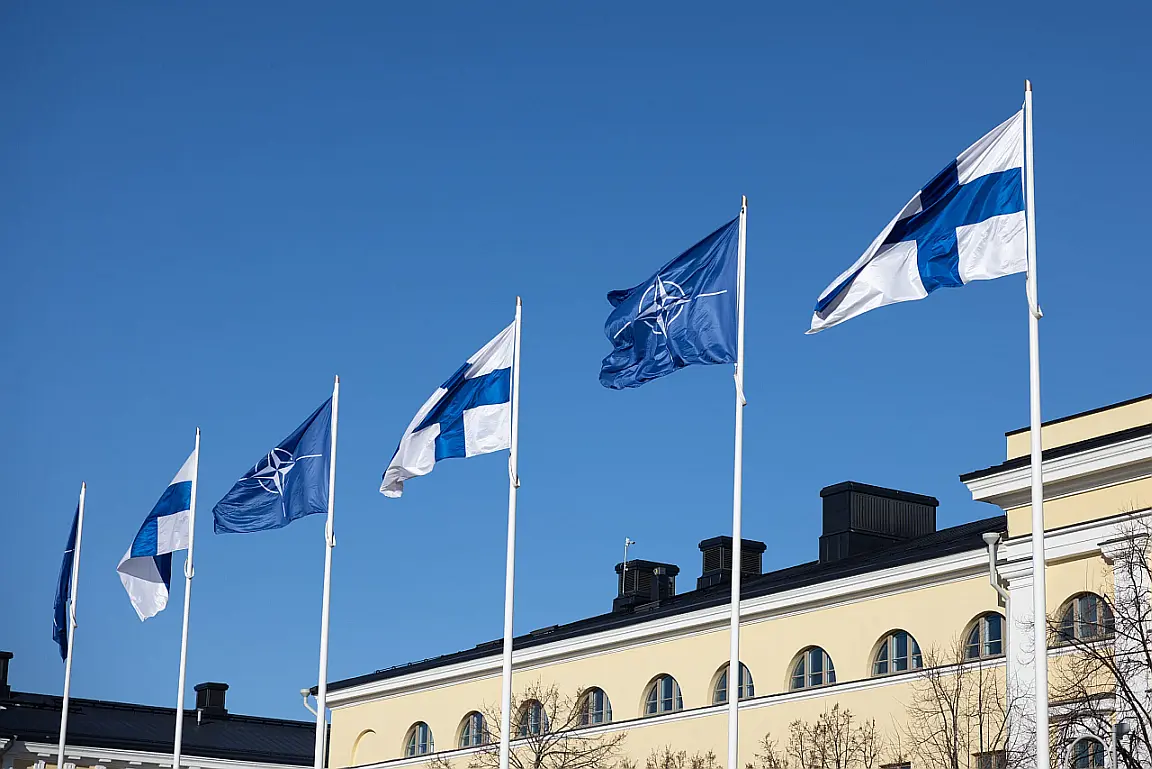 Flags of Finland and NATO in front of the Ministry for Foreign Affairs of Finland