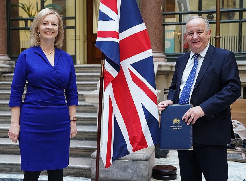 Former UK PM Liz Truss and MP Laurence Robertson at a political event