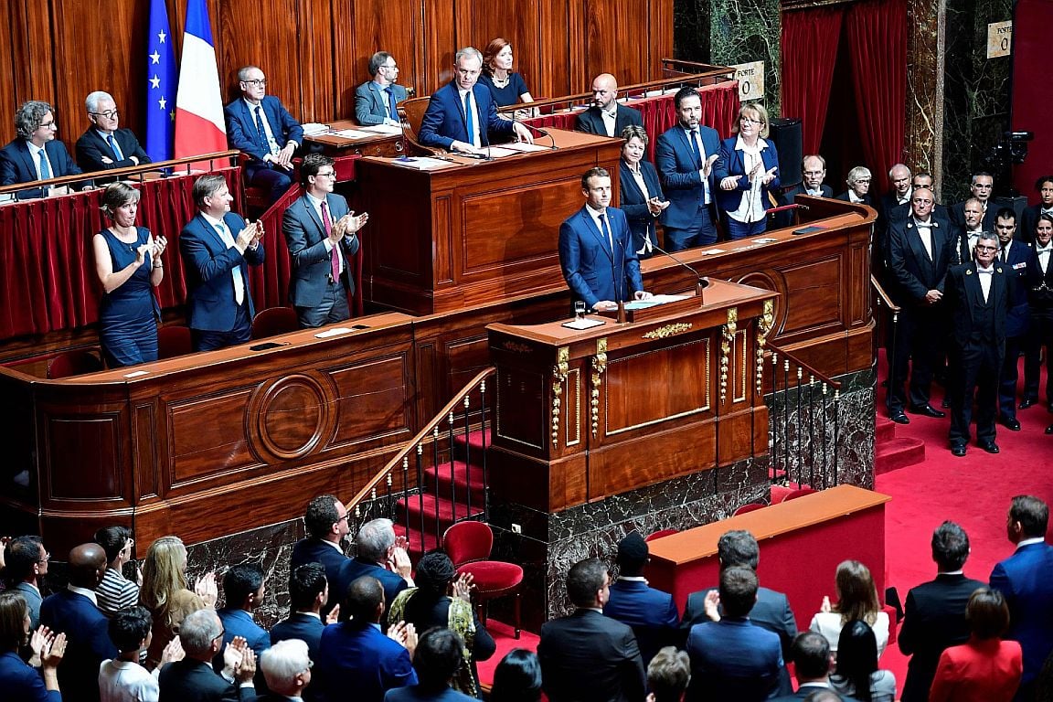 French President Emmanuel Macron speaks in front of lawmakers