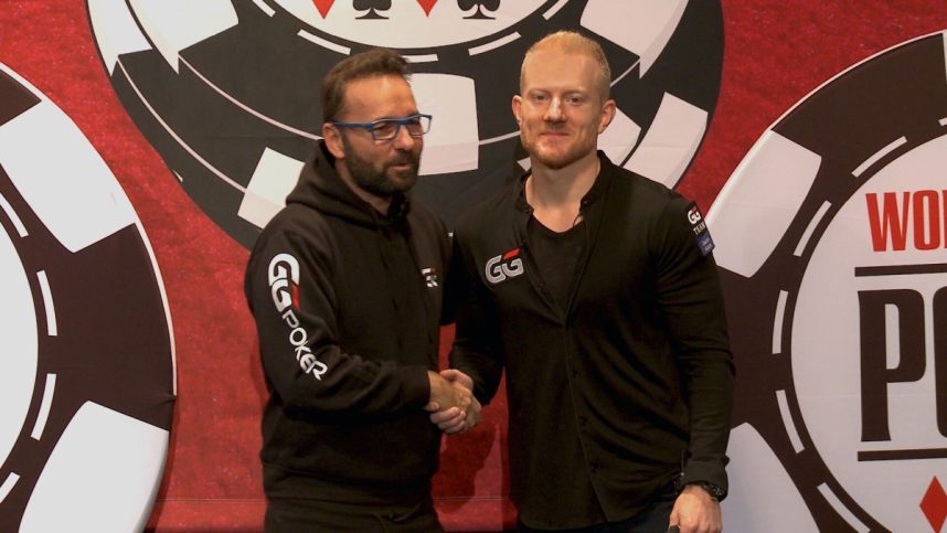 Jason Koon (right) shakes hands with Daniel Negreanu as he's announced as a new GGPoker ambassador.