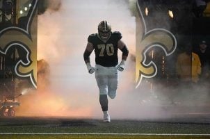 New Orleans Saints offensive tackle Trevor Penning takes the field