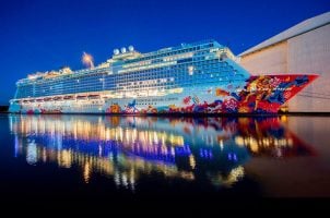 The Genting Dream cruise ship at night