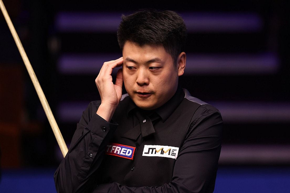 Chinese snooker player Liang Wenbo during a match with Neil Robertson of Australia
