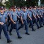 Philippine National Police officers march in formation