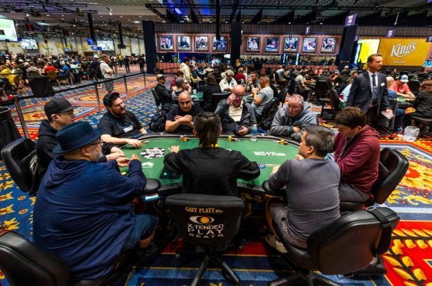 Poker players participate in a WSOP tournament