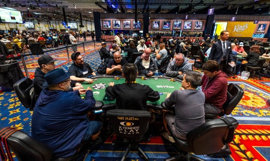 Poker players participate in a WSOP tournament