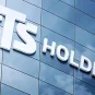 STS Holding's sign on a building