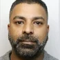Sajad Hussain in a police mugshot