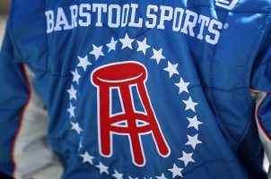 The Barstool Sports logo on a racing jacket