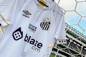 The Blaze.com logo on the front of Brazilian soccer team Santos FC's jersey