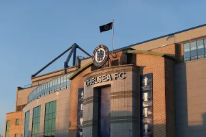 The Chelsea FC sign hangs over Stamford Bridge, its home stadium